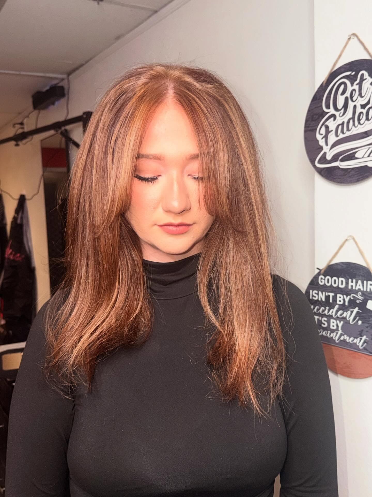 Copper-toned layered hair color in the studio